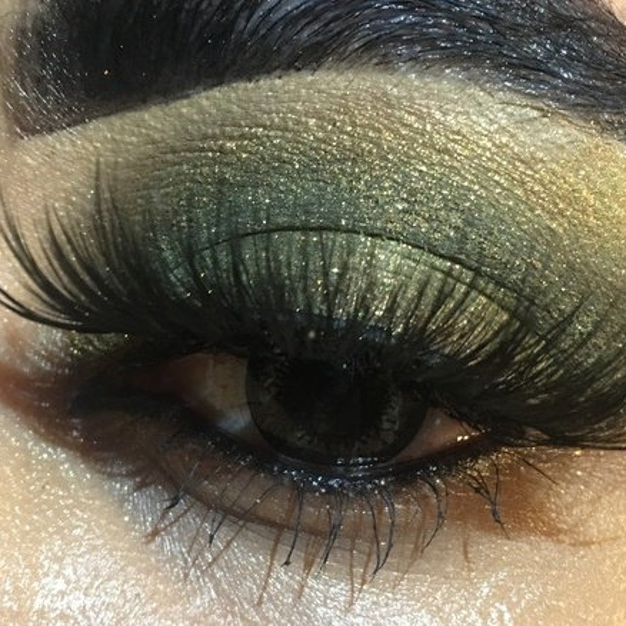 Beauty Realm eyeshadow compact in amber moss shifter shade with gold vegan logo on sleek black case