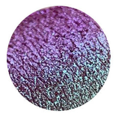 Close-up of Tala Sparkle Mermaid Eye Shadow pot showing iridescent teal and purple powder shimmer