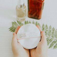 Facial Rounds white cotton pads held in hands with FarmGirlDesign label