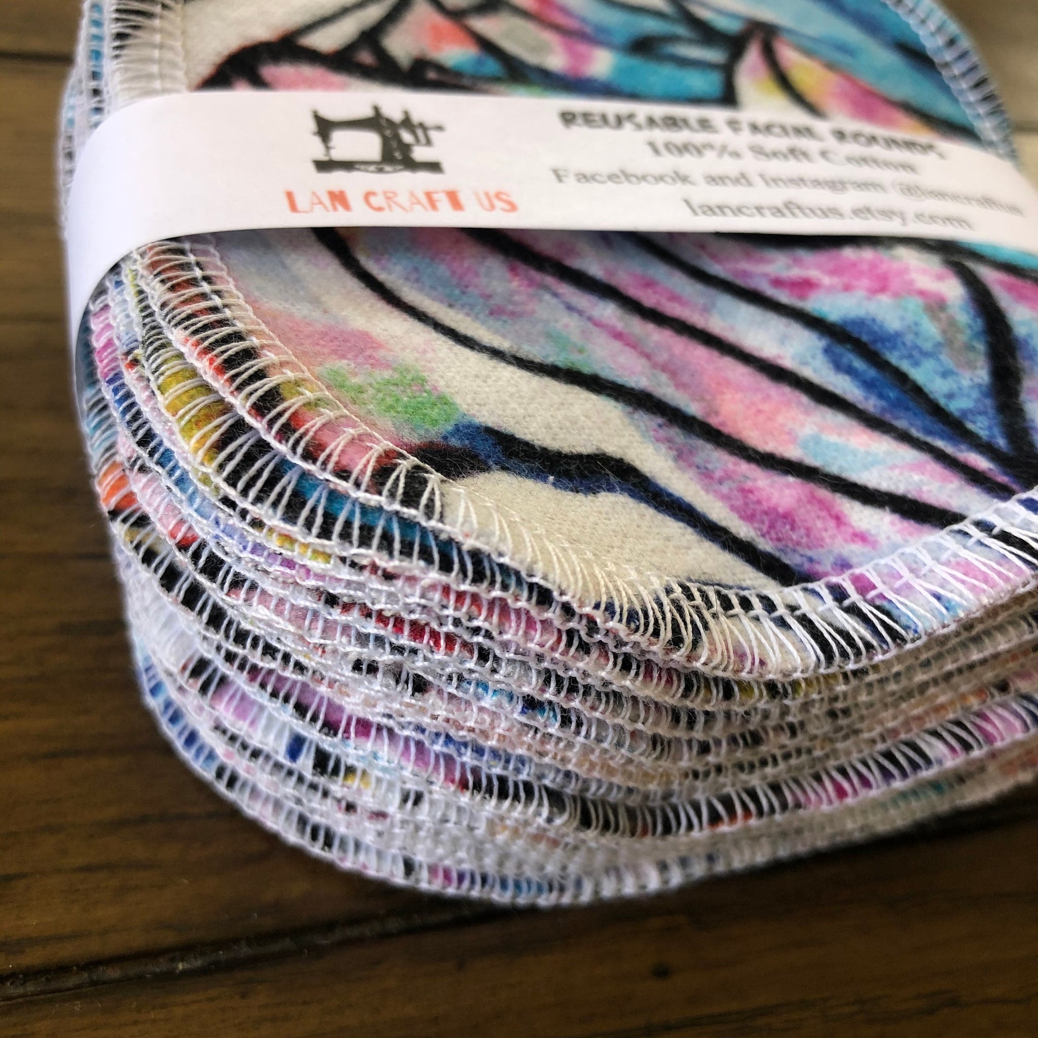 Reusable facial rounds with colorful patterned fabric and white stitching, by LanCraftUS