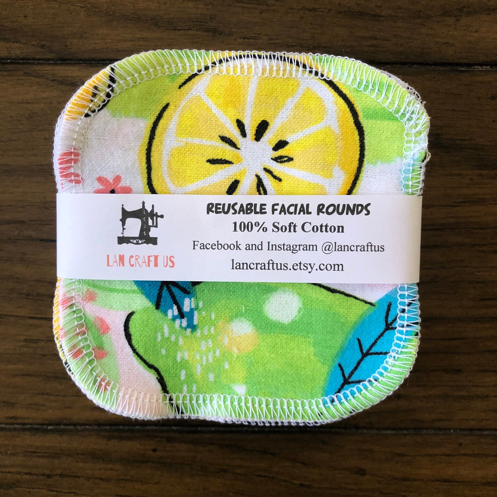 Reusable facial rounds with yellow lemon print, white stitching, and LAN CRAFT US label