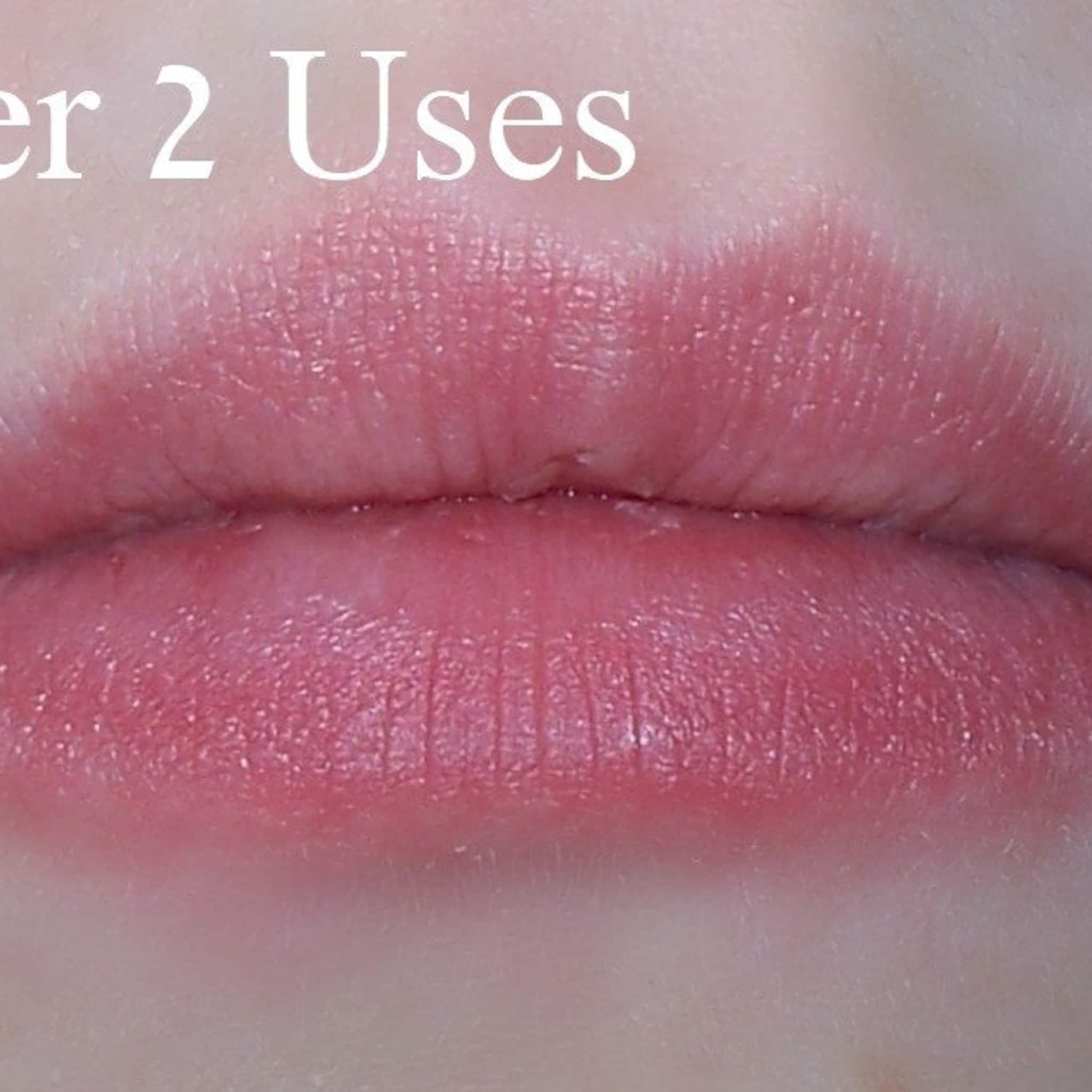 Lip close-up of pink lips with visible texture and light skin around them
