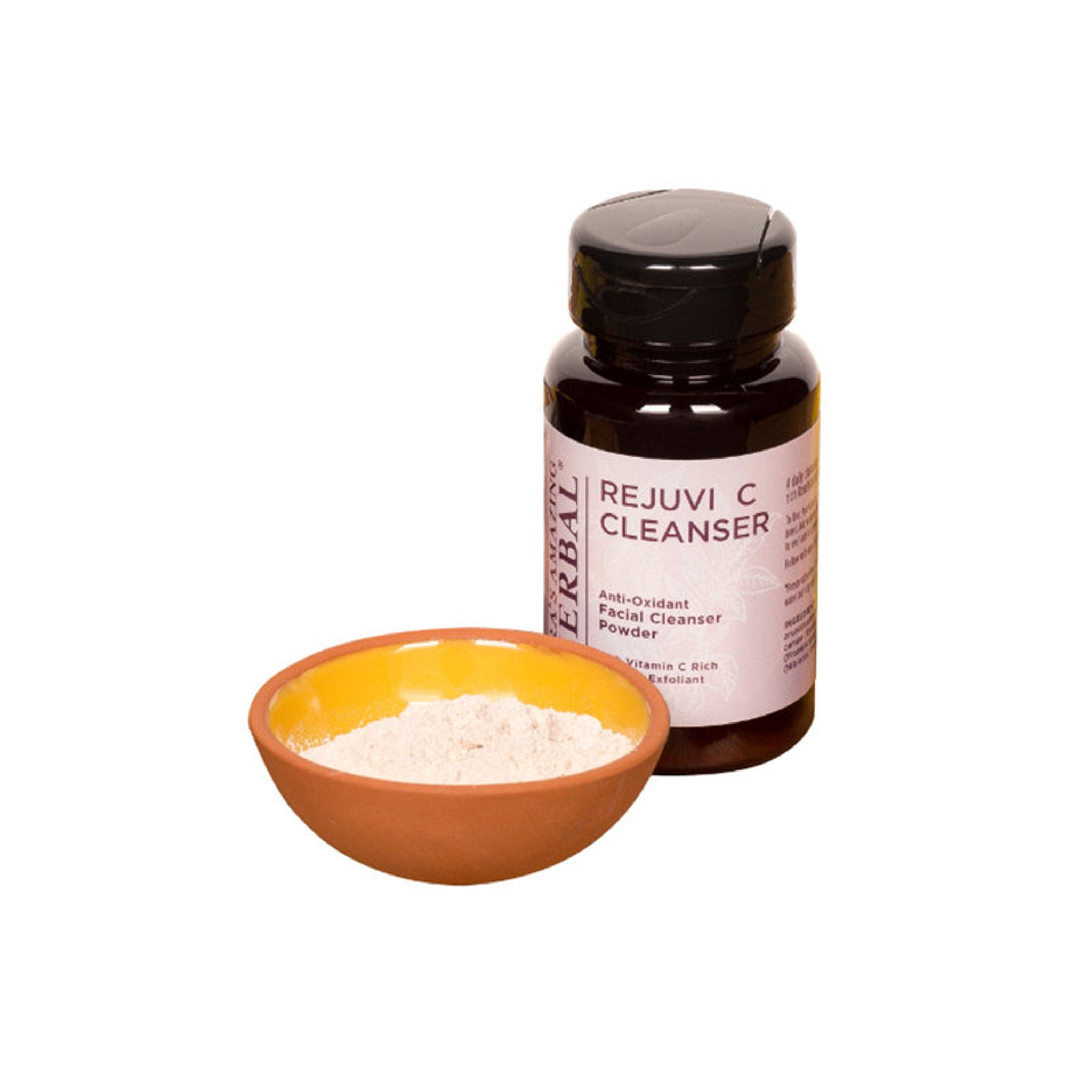 Facial cleanser powder with brown bowl and dark bottle, Rejuvi Herbal brand