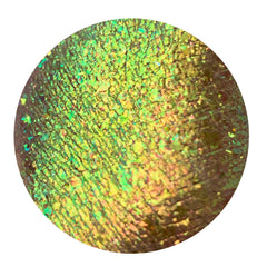 Close-up of Tala Foil Lizard Eye Shadow Pigment FL12 in a small pot with shimmering emerald green powder