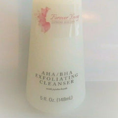 Exfoliating cleanser bottle, off-white with pink logo, text "Forever Young" visible