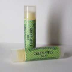 Lip balm tubes with green and white checkered label, Candle Lynn branding, and clear cap