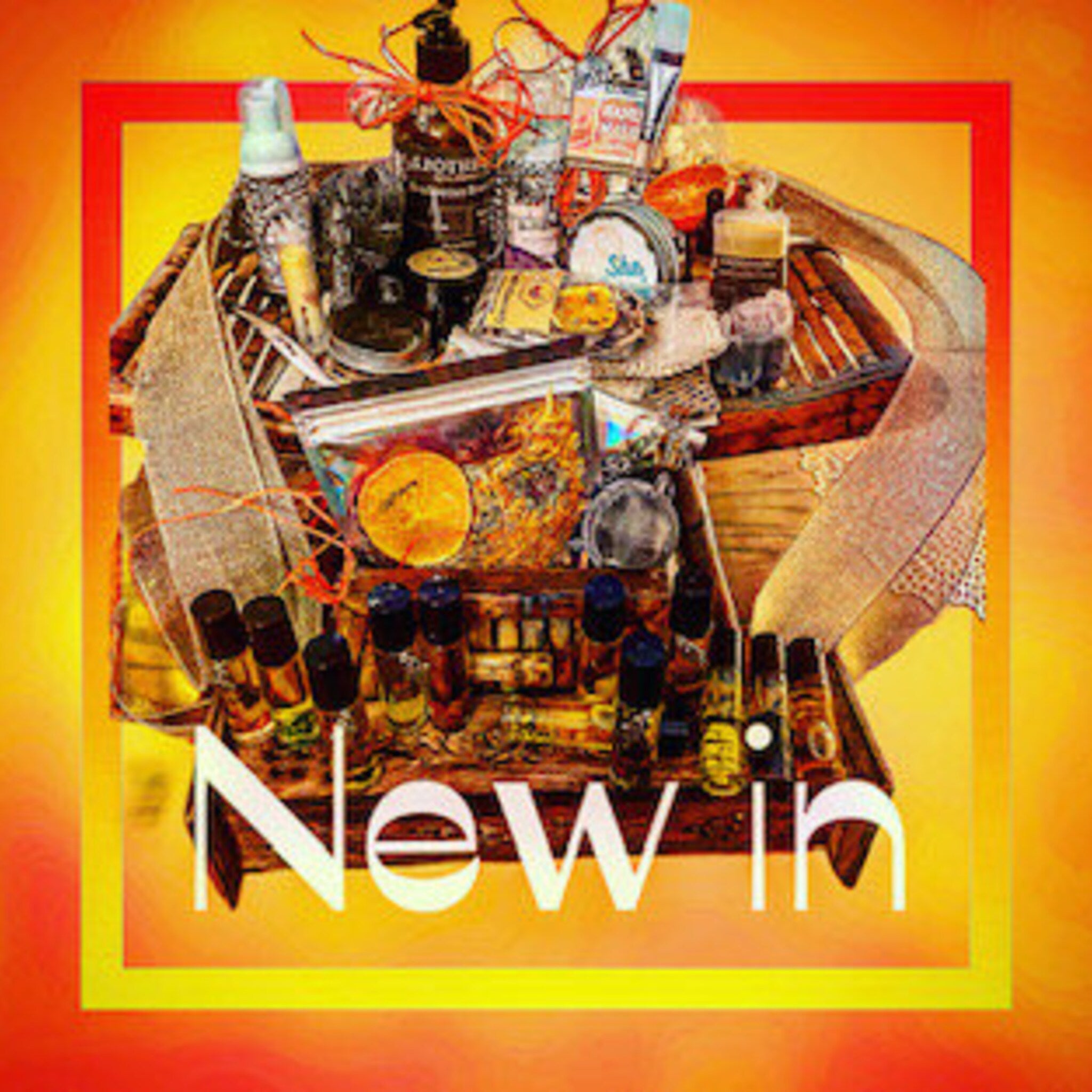 New In products display with bottles and jars, visible text, and orange and yellow background