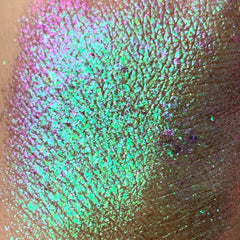 Side view of Tala Foil Candy Eye Shadow Pigment in shade FL13, showcasing metallic finish and compact 2ml bottle design