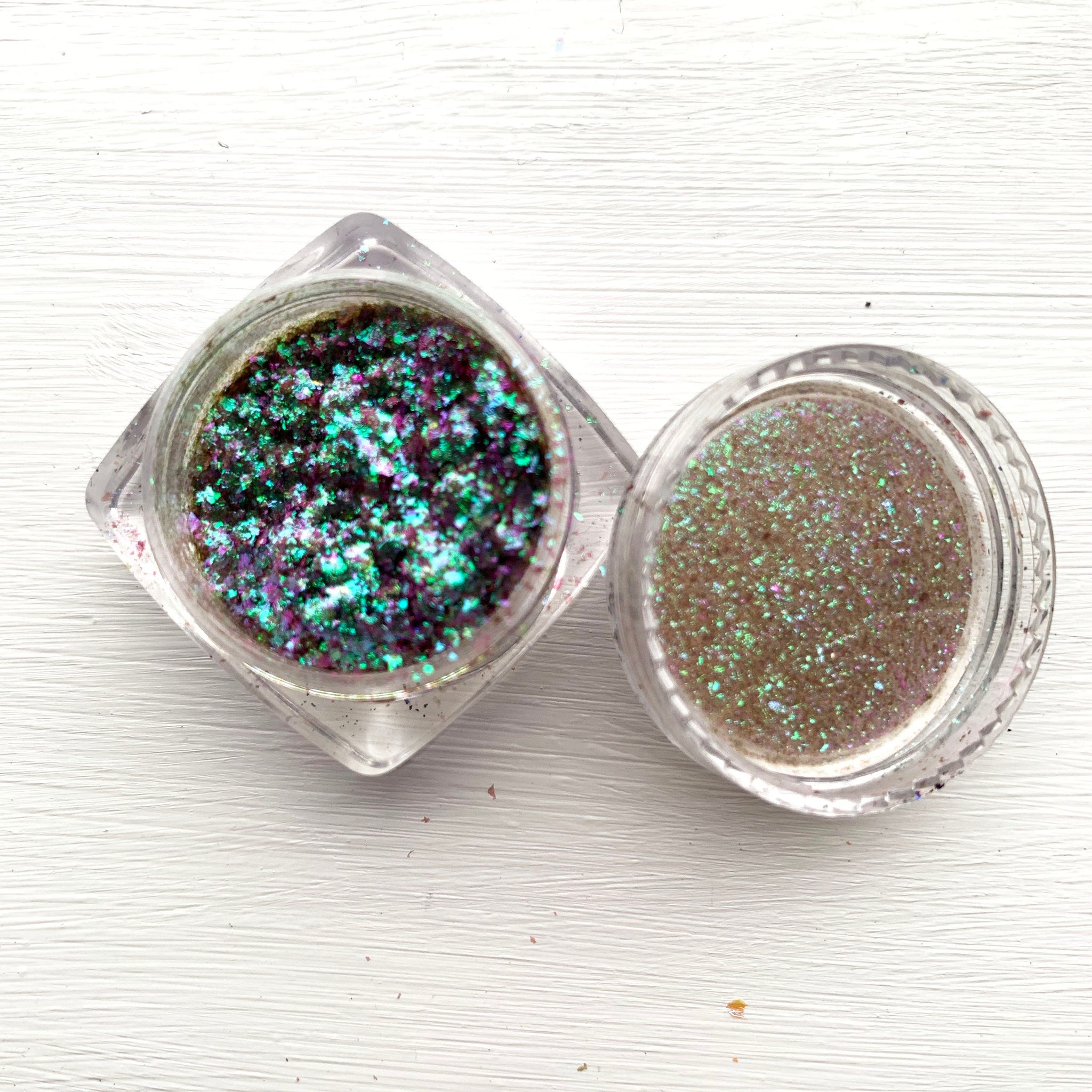 Side view of Tala Foil Candy Eye Shadow Pigment in shade FL13 showing metallic pink shimmer in sleek 2ml tube