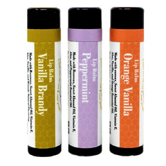 Lip balm set with black caps, colorful labels, and Sister Bees text visible