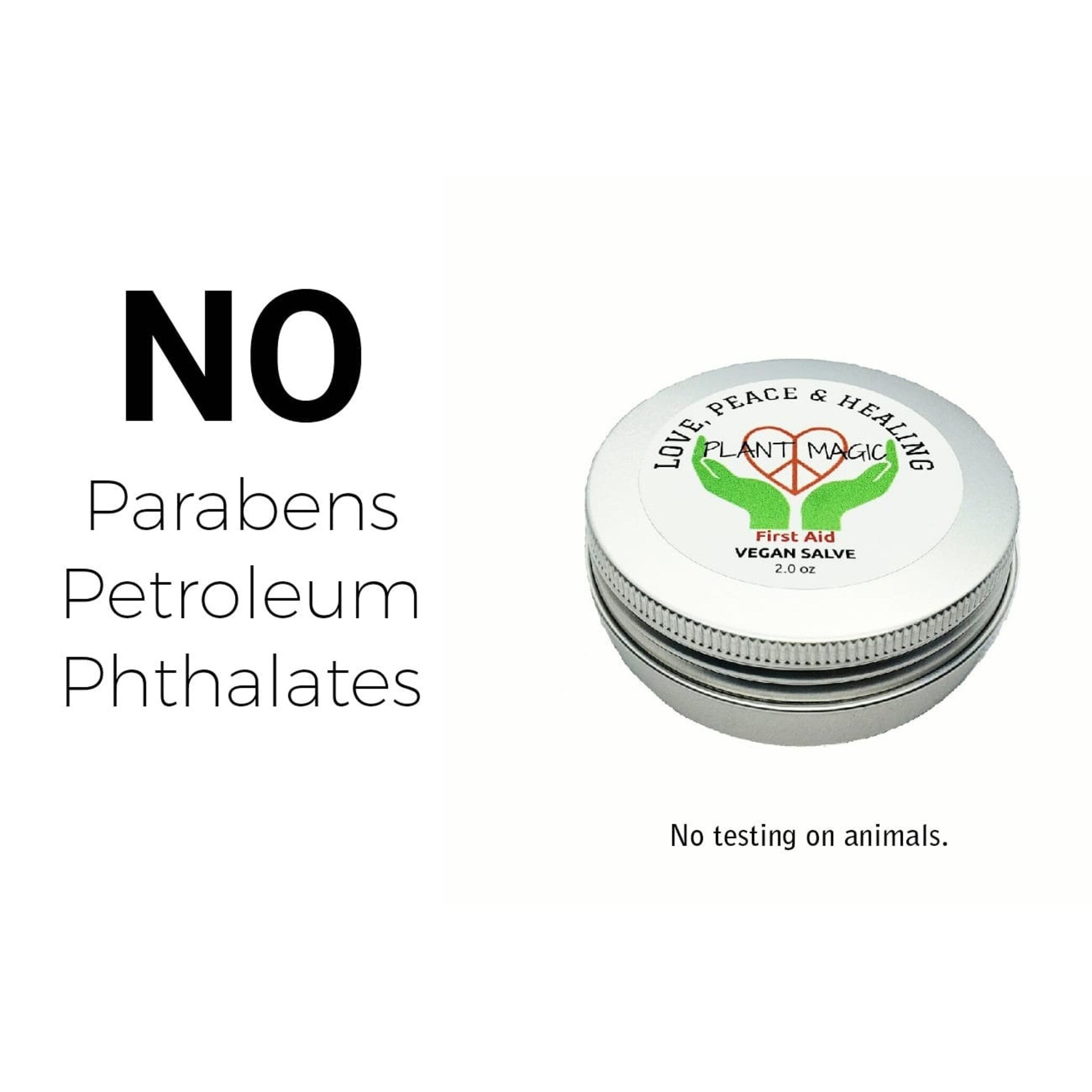 Vegan salve in silver metal tin with white label and PLANT MAGIC text, for first aid use