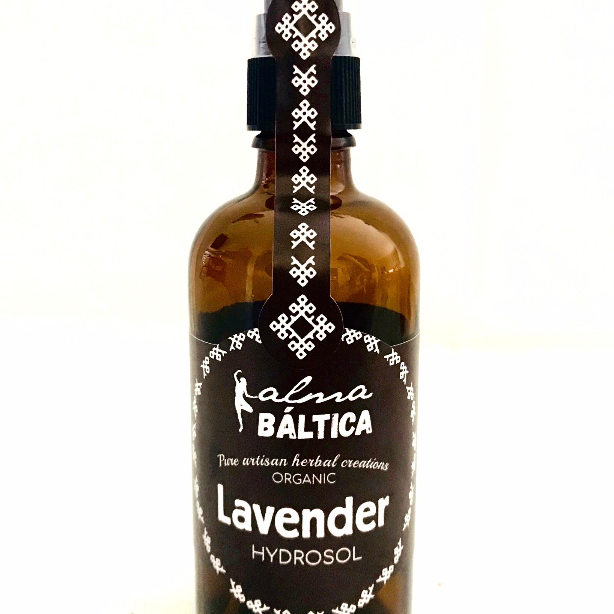 Lavender hydrosol brown glass bottle with black label and white text, "Alma Baltica" brand