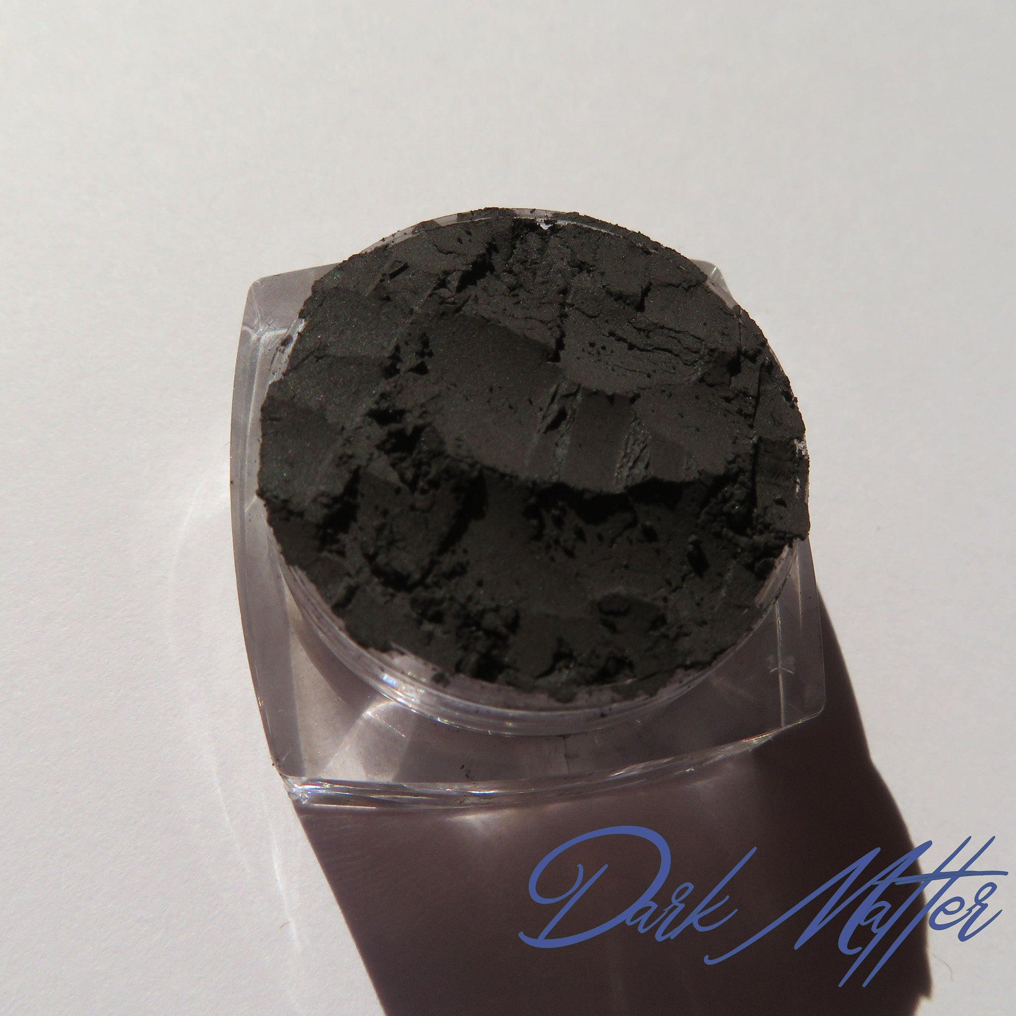 Black and white matte eyeshadow duo in sleek compact with vegan logo on front