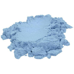 Side view of sky blue mica pigment powder in a sleek glass jar with silver lid, showcasing fine shimmer texture