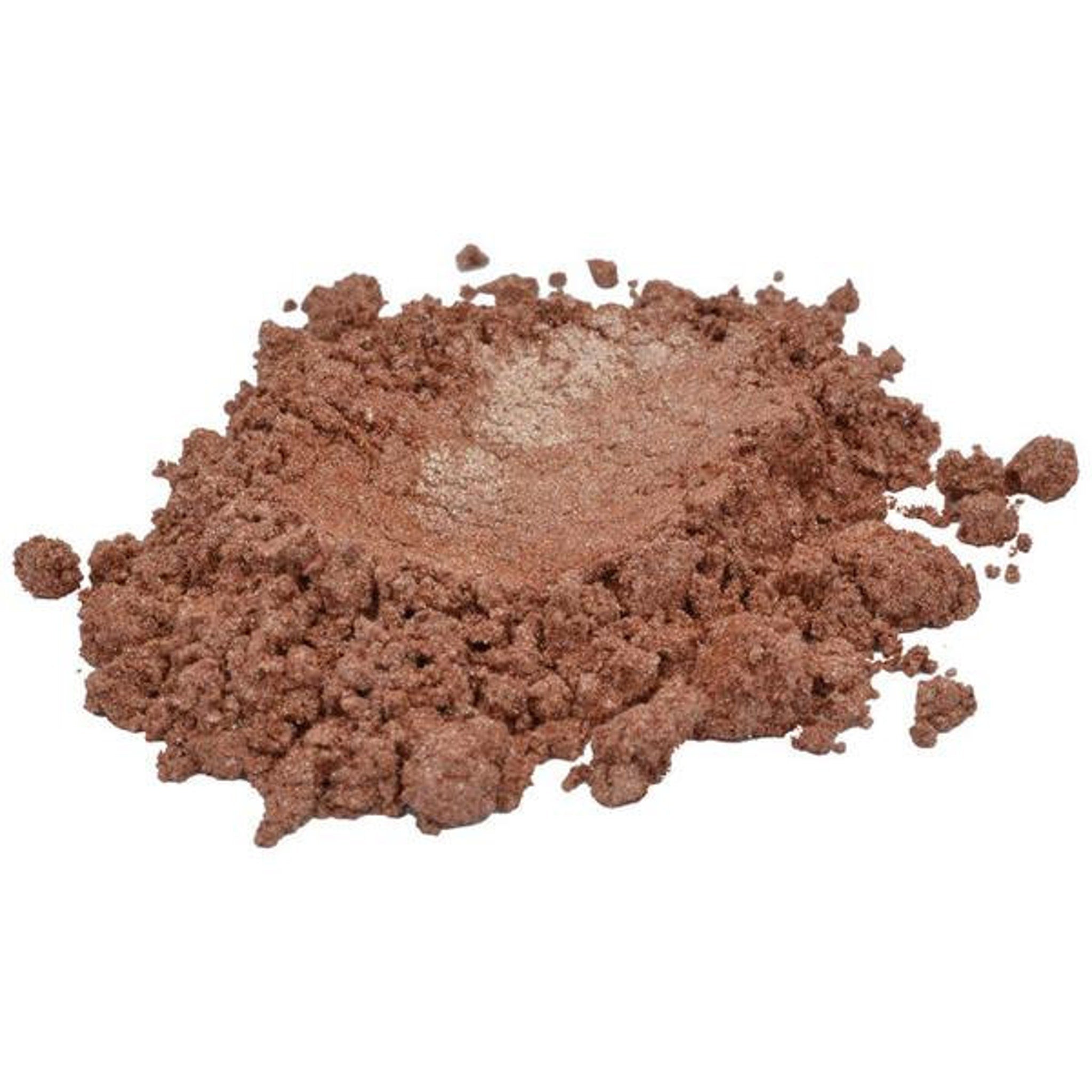 Brown powder with granular texture and shimmer, isolated on white background