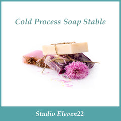 Soap bars with beige, pink, and purple colors, tied with twine, with Studio Eleven22 text.