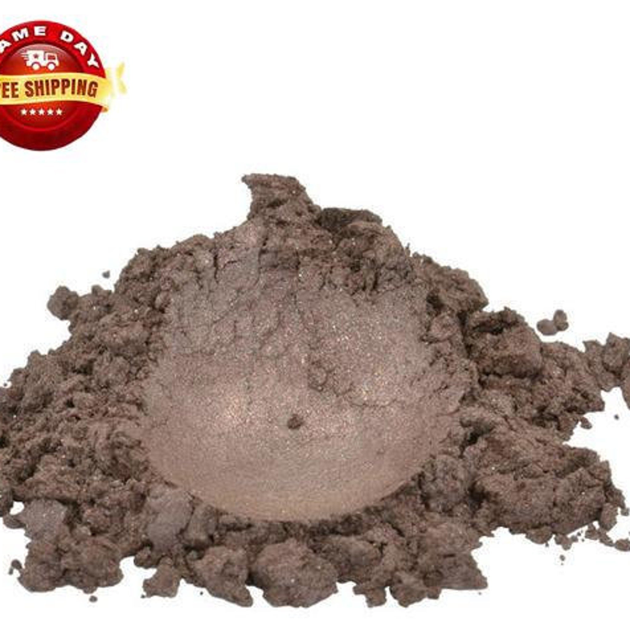 Close-up of luxurious brown mica pigment powder with shimmering moonstone sparkle in a sleek cosmetic jar