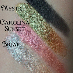 Eyeshadow swatches with green, pink, gold and black glitter, "Mystic", "Carolina Sunset", and "Briar" text visible