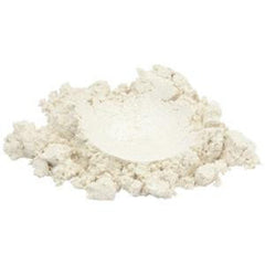 Side view of white mica pigment powder jar showing pearlescent shimmer and fine texture