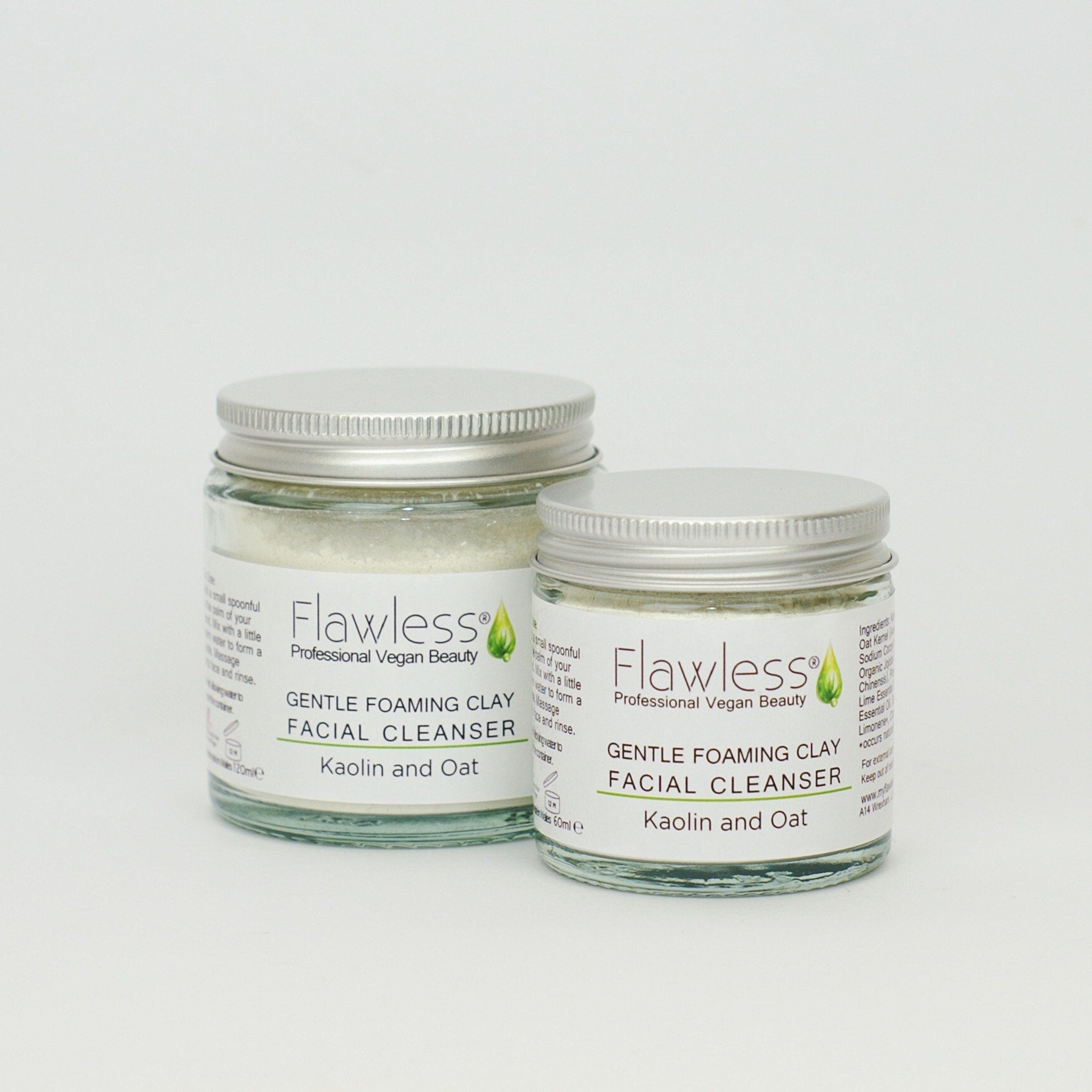 Facial cleanser jars with silver lids, glass jars, and "Flawless" branding displayed