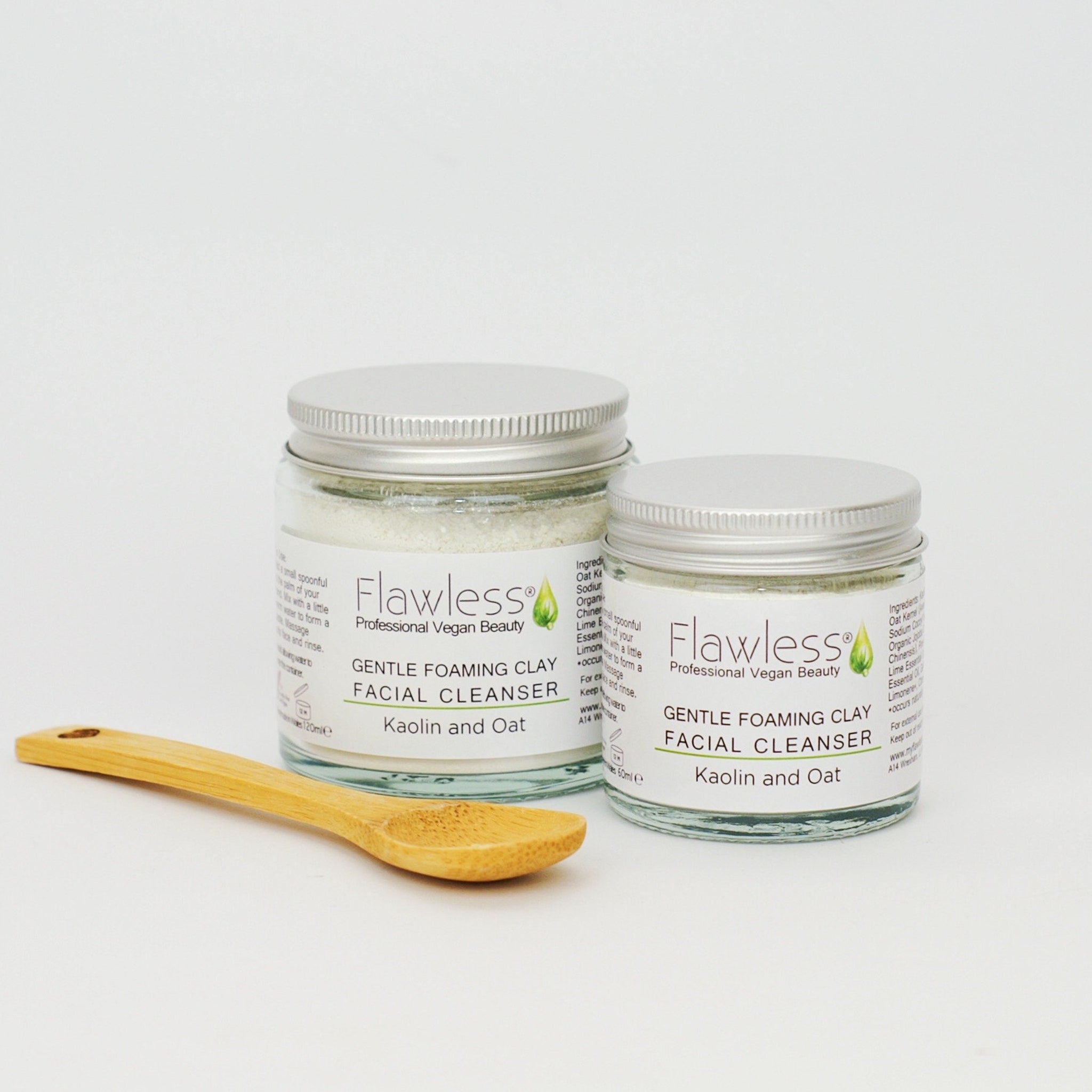 Facial cleanser jars with white powder, silver lids, and wooden spoon, Flawless brand visible
