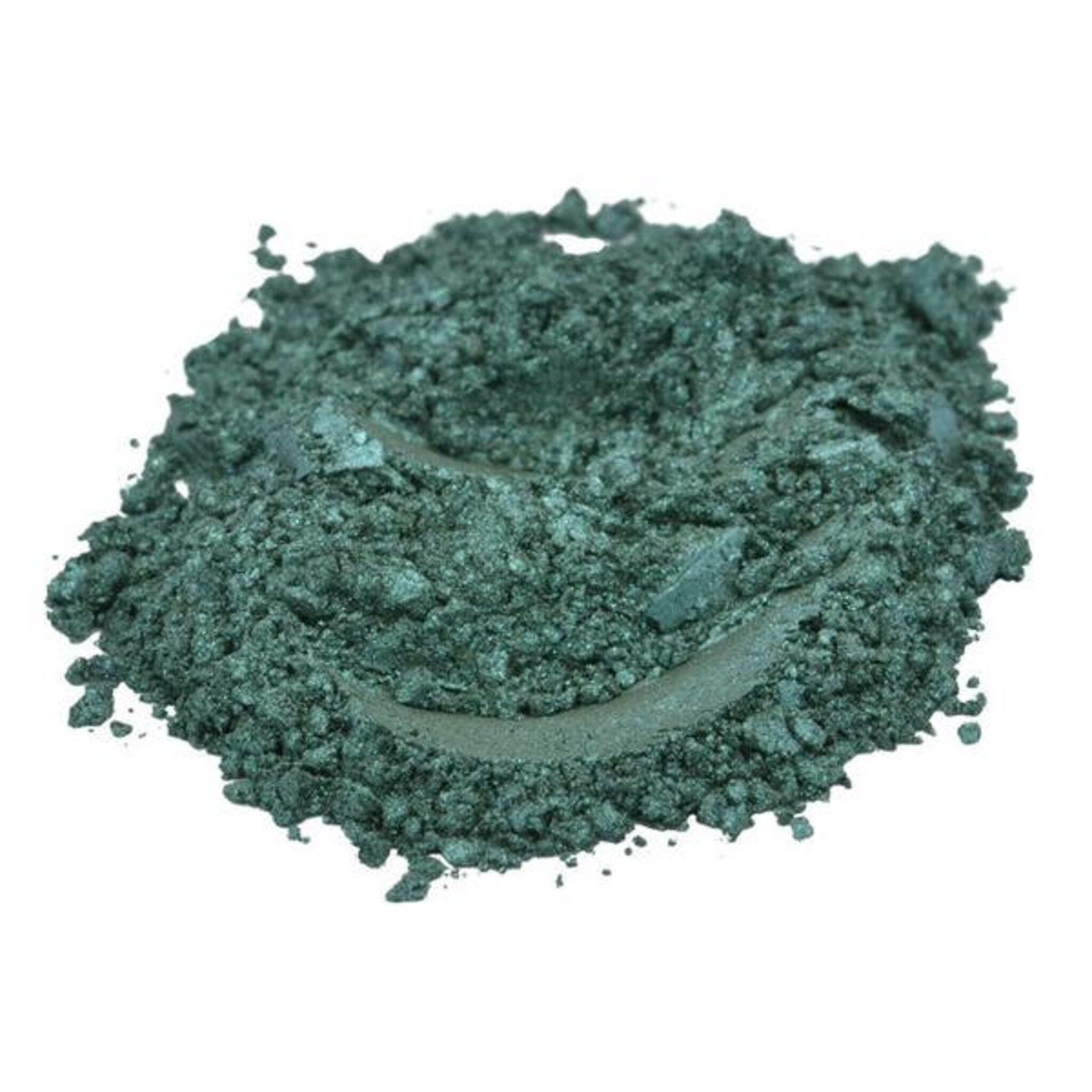 Close-up of dark stale green mica pigment powder shimmering in natural light with fine texture