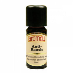 Essential oil bottle with black cap, brown glass, and "aromell" label