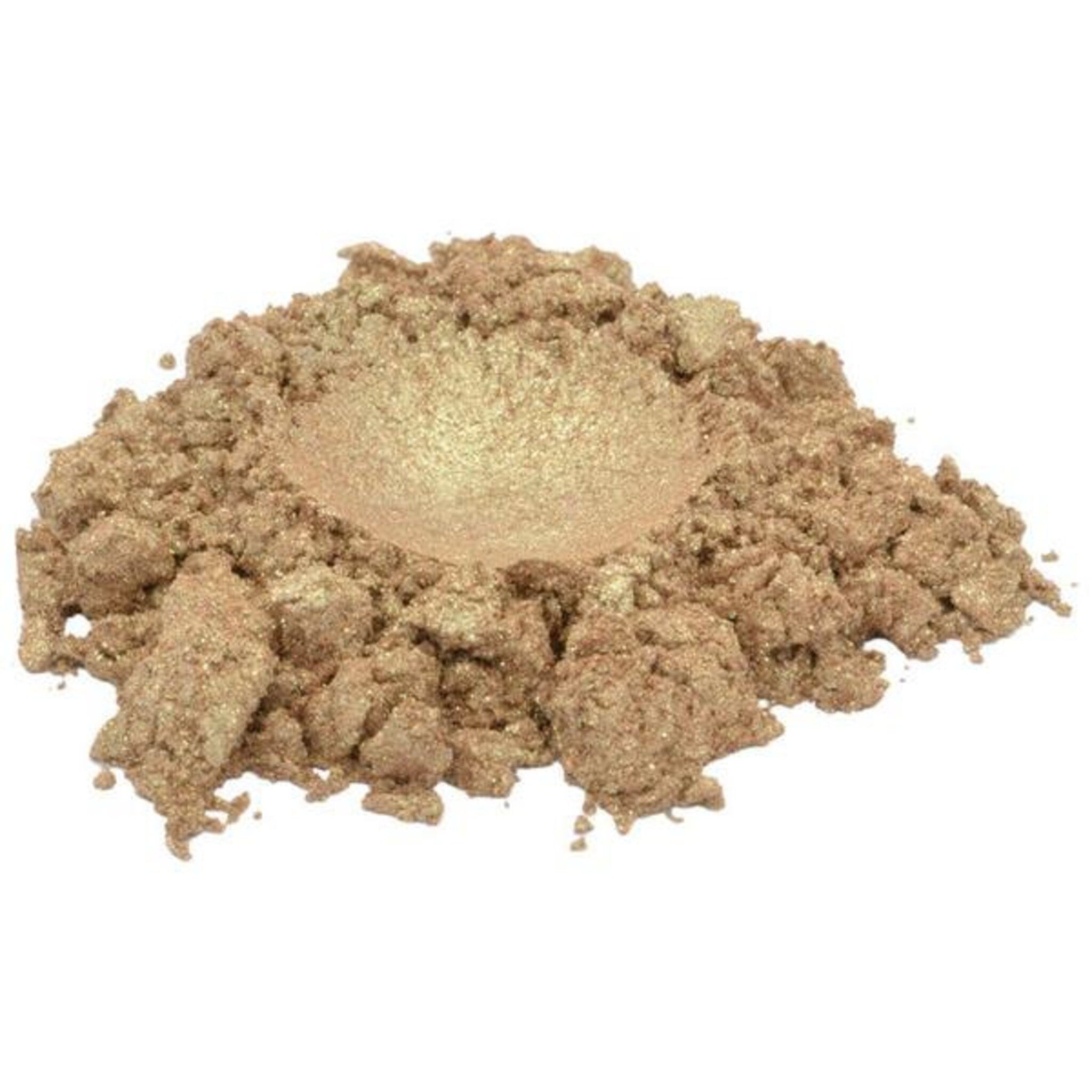 Close-up of golden cinnamon sugar mica powder shimmering in sunlight with luxurious metallic finish