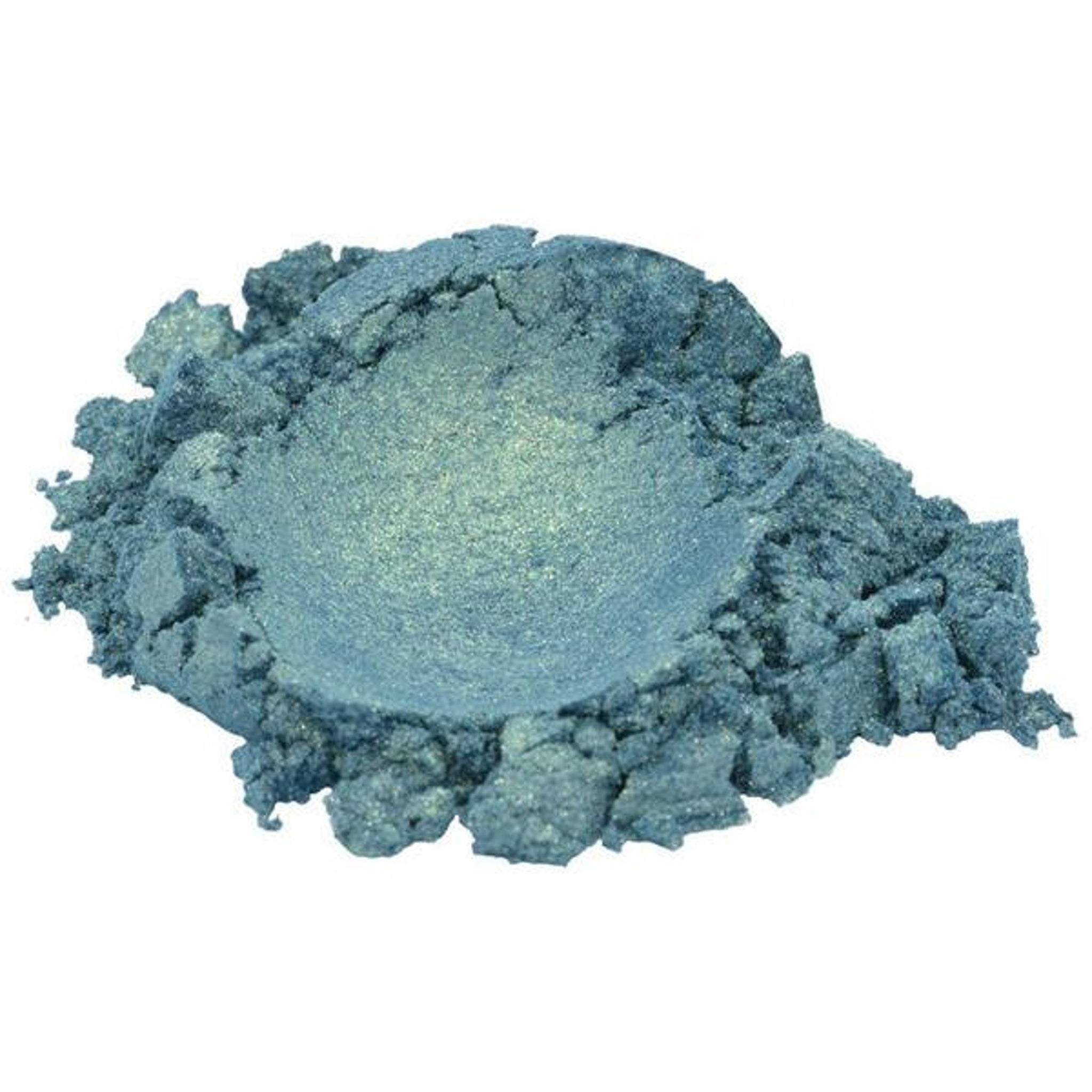 Close-up of shimmering aquamarine mica powder with reflective ocean green particles in glass jar