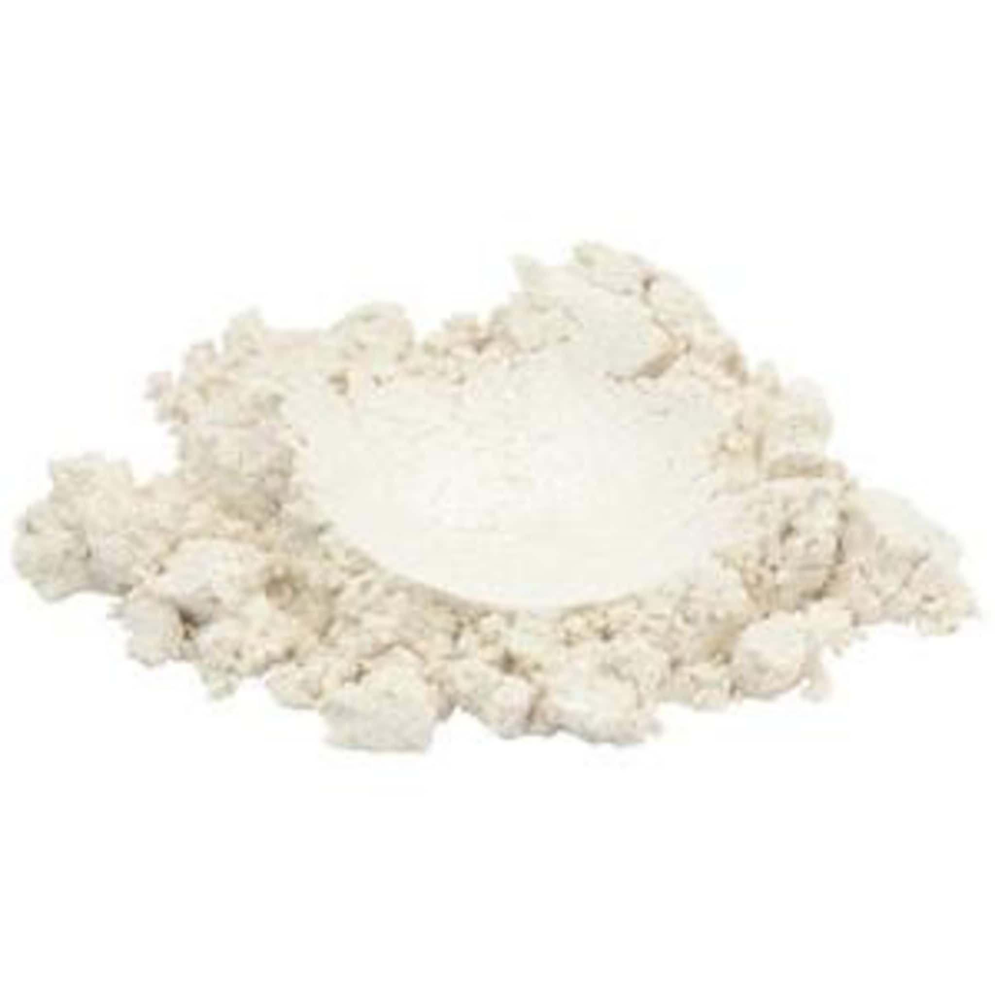 Powdered pigment in light beige color with a textured finish, loose and granular