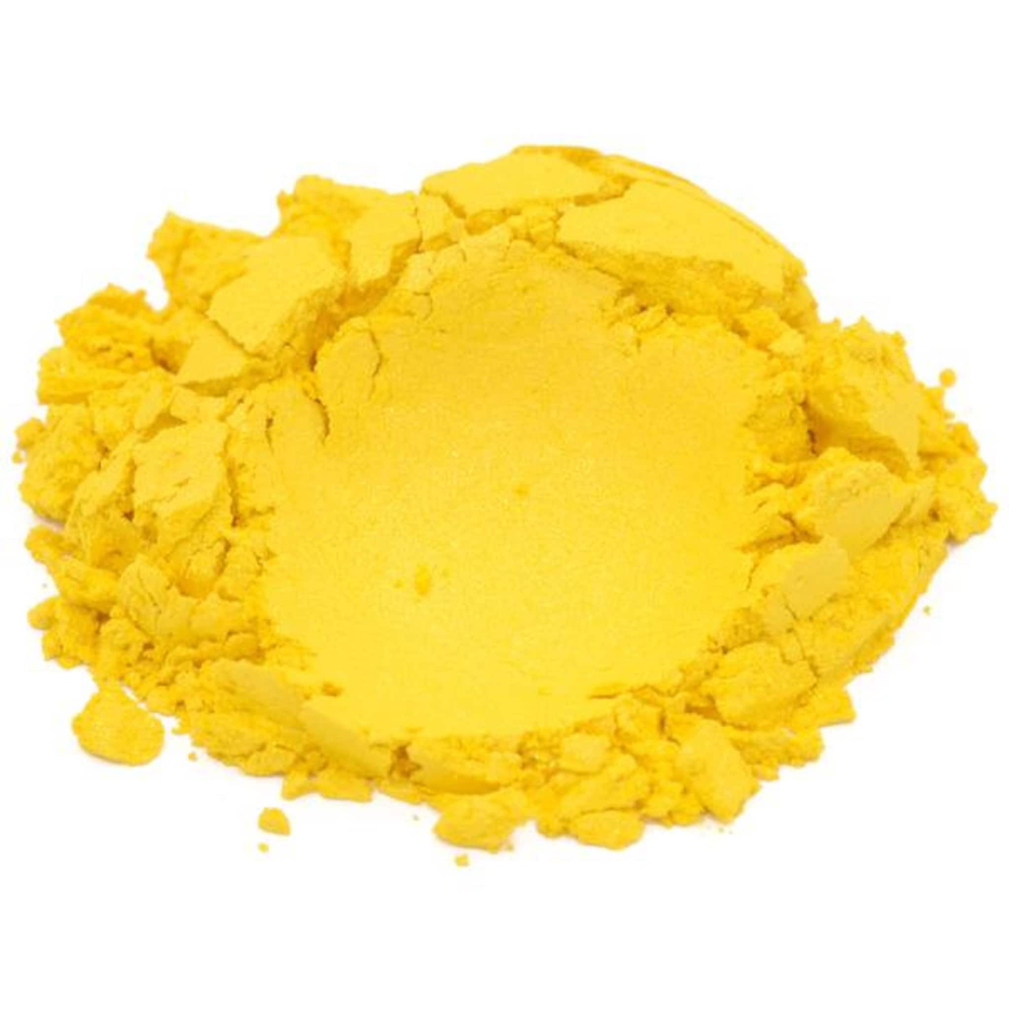 Side view of glass jar filled with vibrant yellow mica powder, gold lid sealed tightly