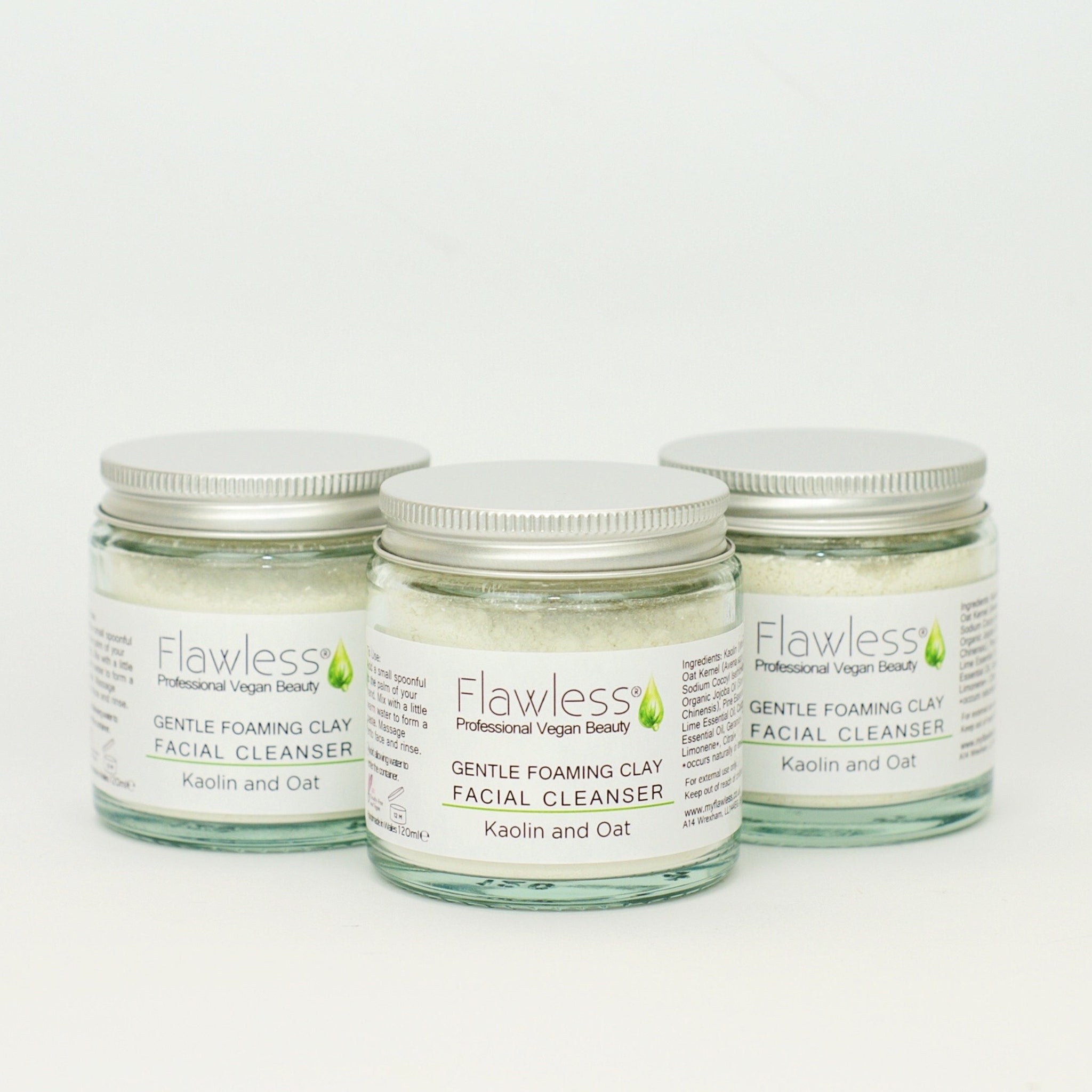 Gentle Foaming Clay Facial Cleanser in glass jars with silver lids, labeled "Flawless" brand