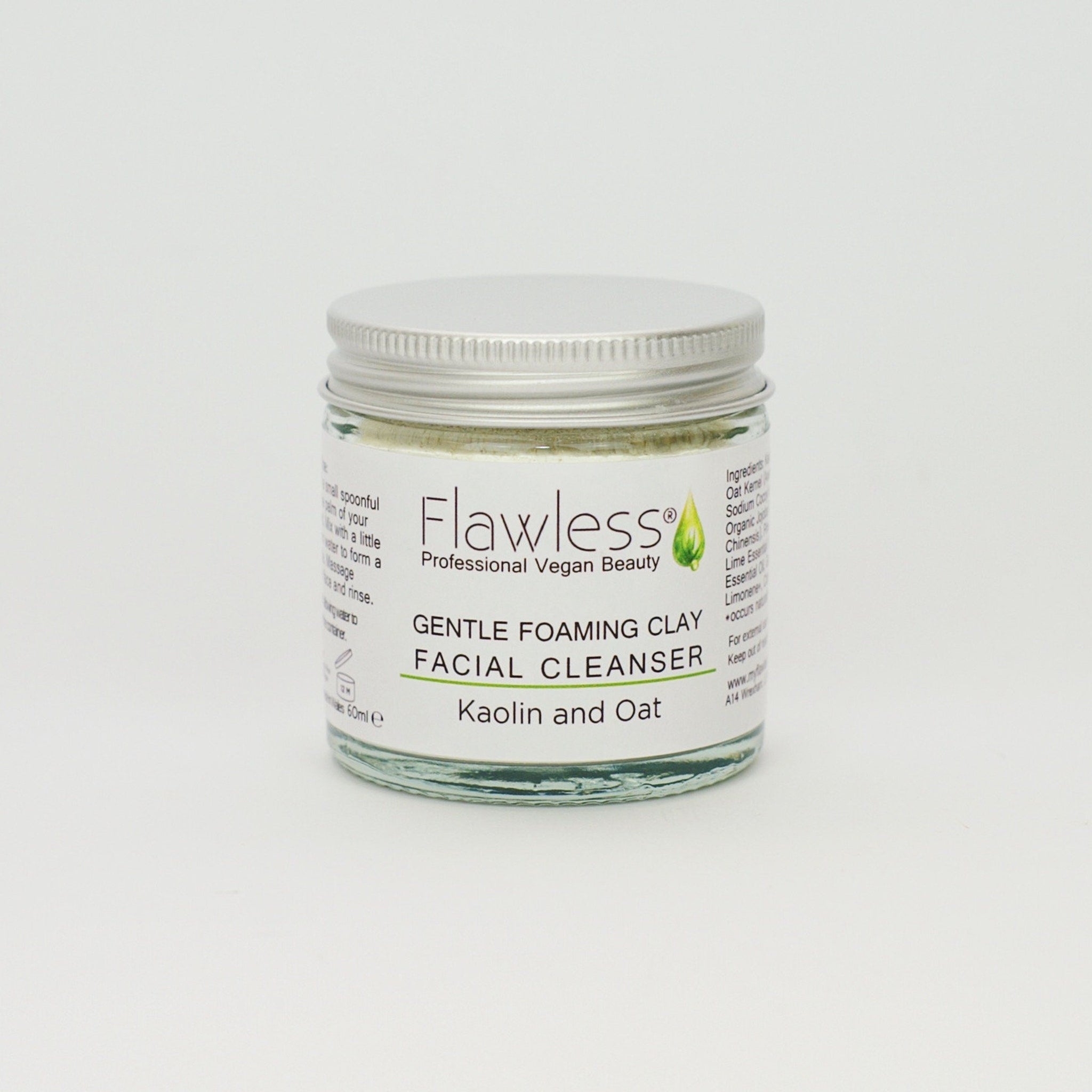 Facial cleanser jar with silver lid, glass body, and Flawless label on white background