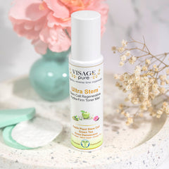 Toner mist bottle white with Ultra Stem text, on speckled tray with flowers