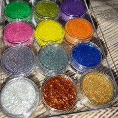 Close-up of shimmery vegan eyeshadows in 12 vibrant shades with high pigmentation for bold eye looks