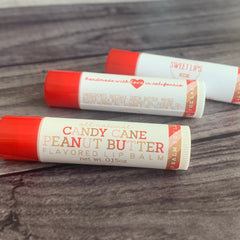 Lip balm tubes with red caps and white labels, Candy Cane Peanut Butter flavor, Sweet Lips brand