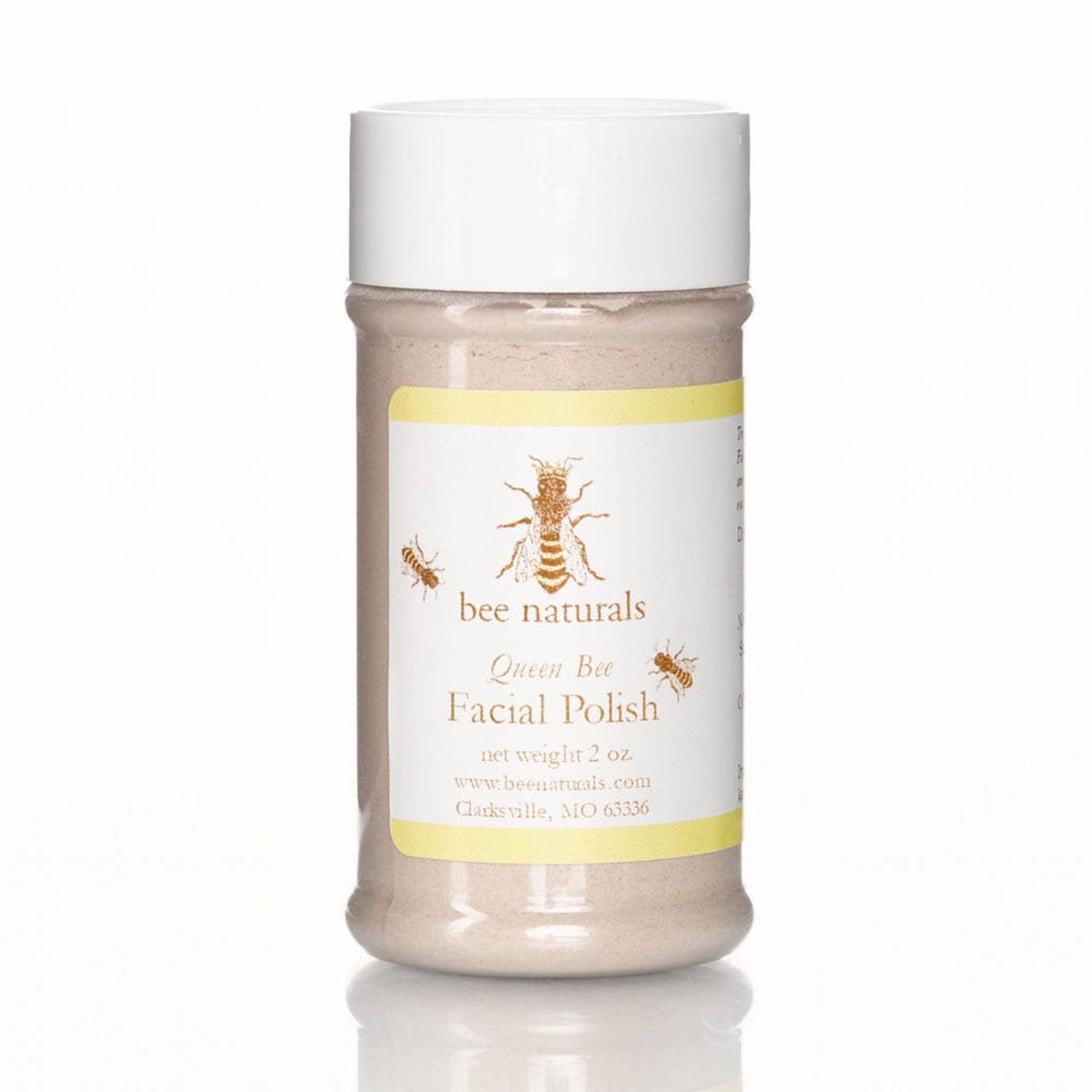 Facial Polish jar with white lid, beige powder, and yellow label with "bee naturals" text on it.
