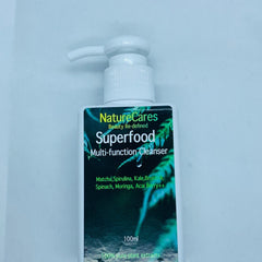 Cleanser bottle, white plastic pump, green and white label with "Superfood" text, NatureCares brand