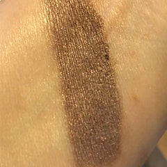 Eyeshadow swatch, brown shimmer, textured application on skin