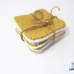 Makeup remover wipes, yellow geometric pattern, white trim, tied with twine