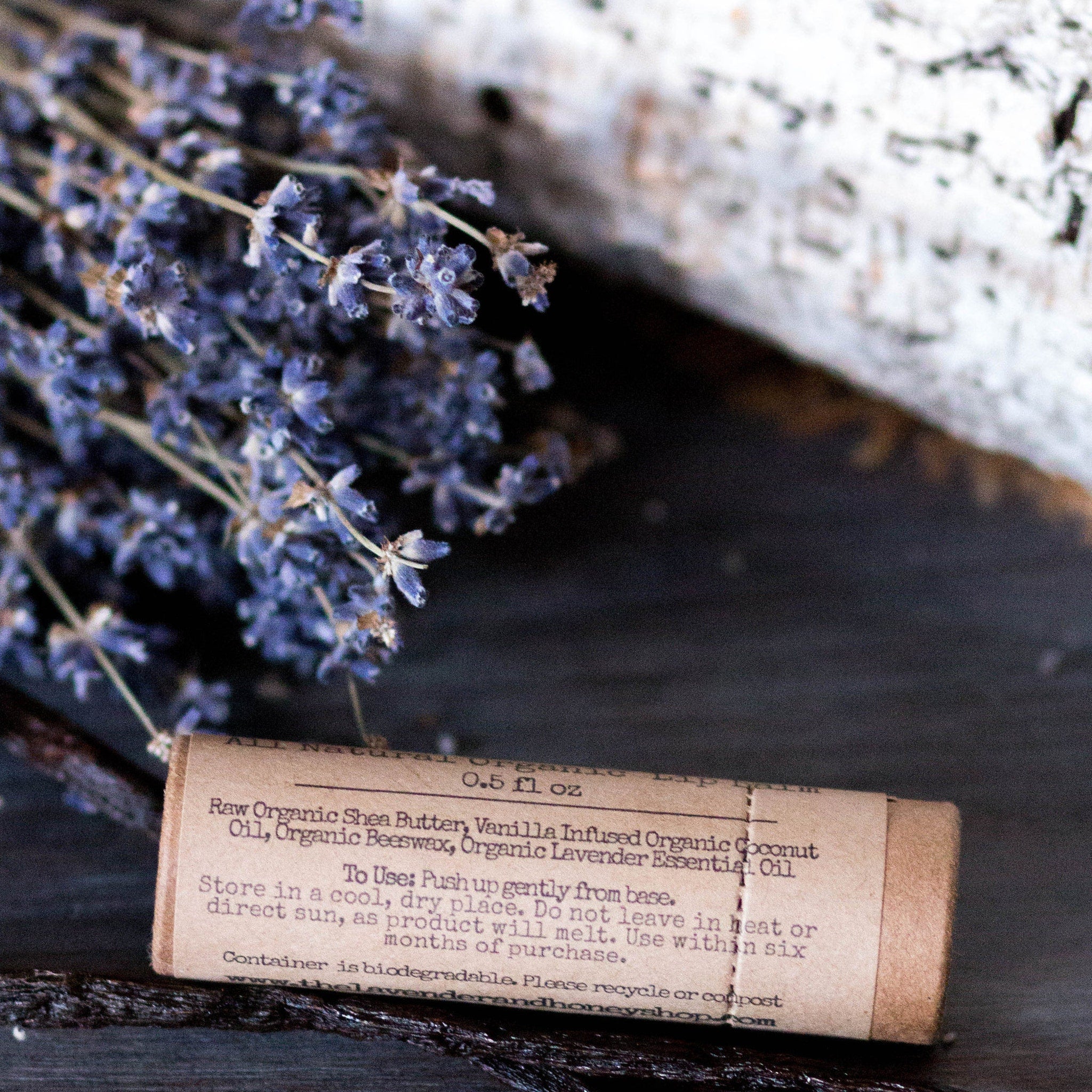 Lip balm tube in brown paper, with lavender and vanilla bean, for skincare use