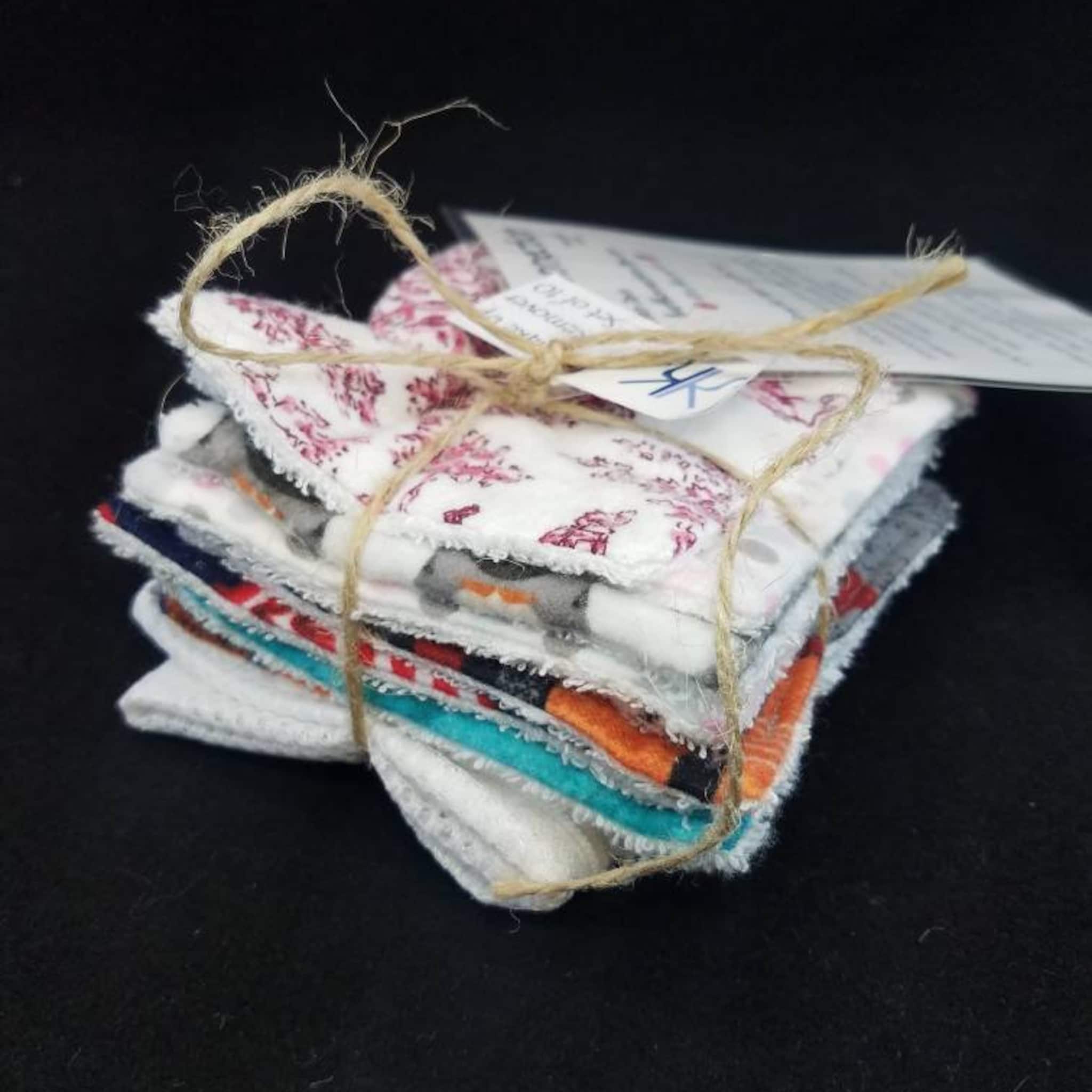 Reusable facial rounds, assorted colors and patterns, tied with twine, with tag attached