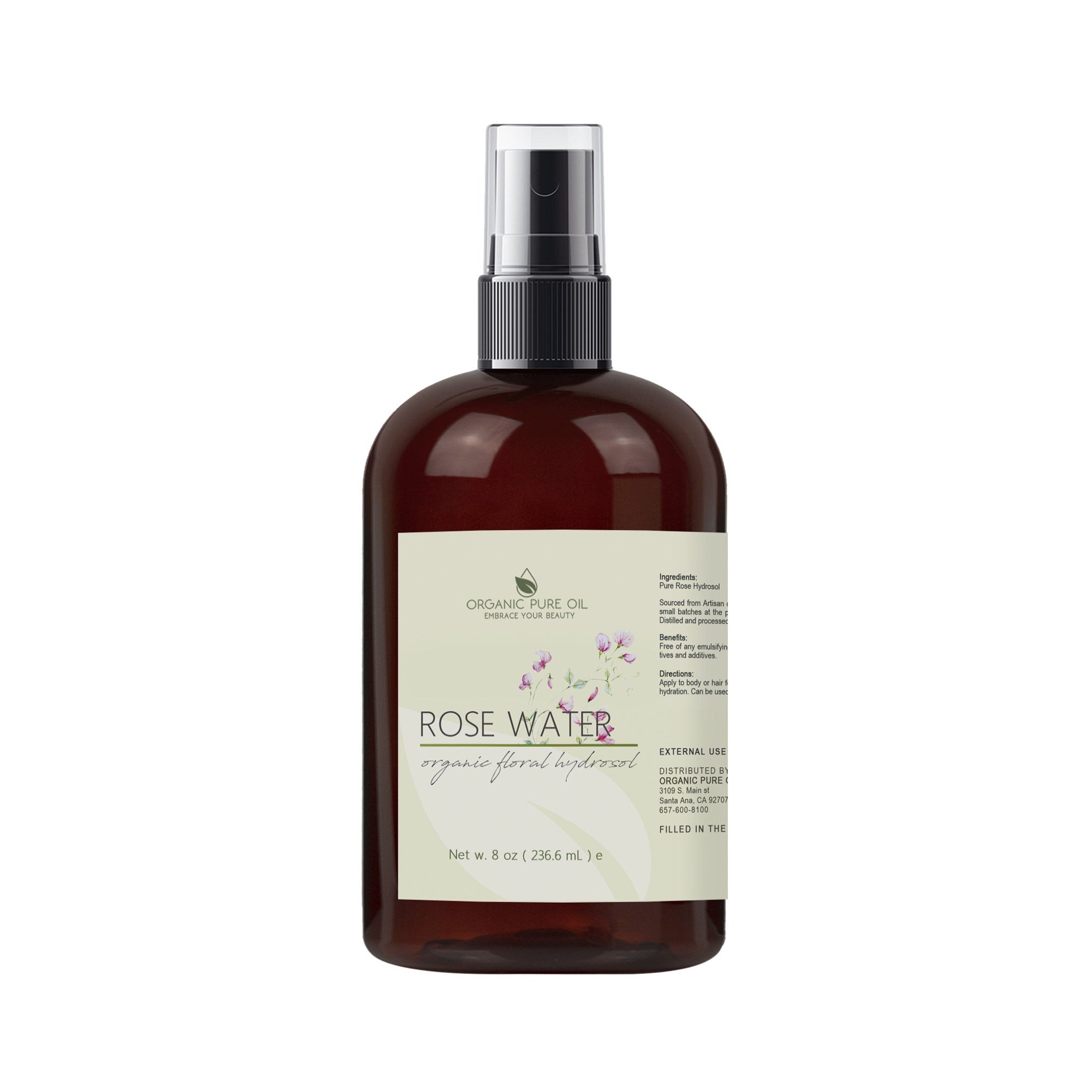 Rose water bottle, brown glass bottle with black spray top, white label with text