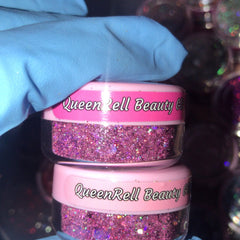 Side view of iridescent chunky glitter set in assorted colors, showcasing texture and sparkle in clear jars