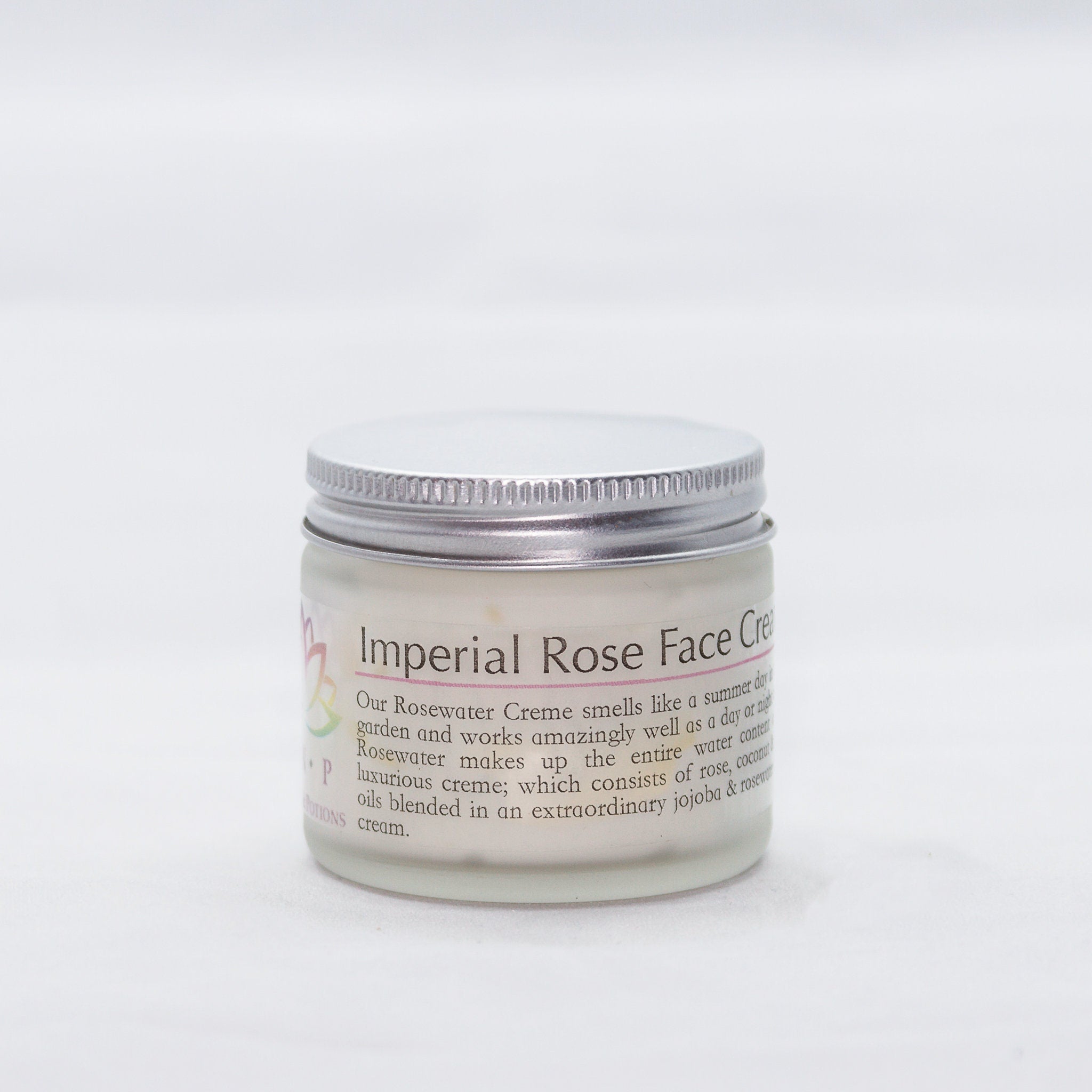 Face cream jar with silver lid, glass jar, and Imperial Rose label text visible