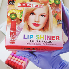 Lip gloss box with "Beauty Treats" text, red and pink fruit design, and lip shiner bottles
