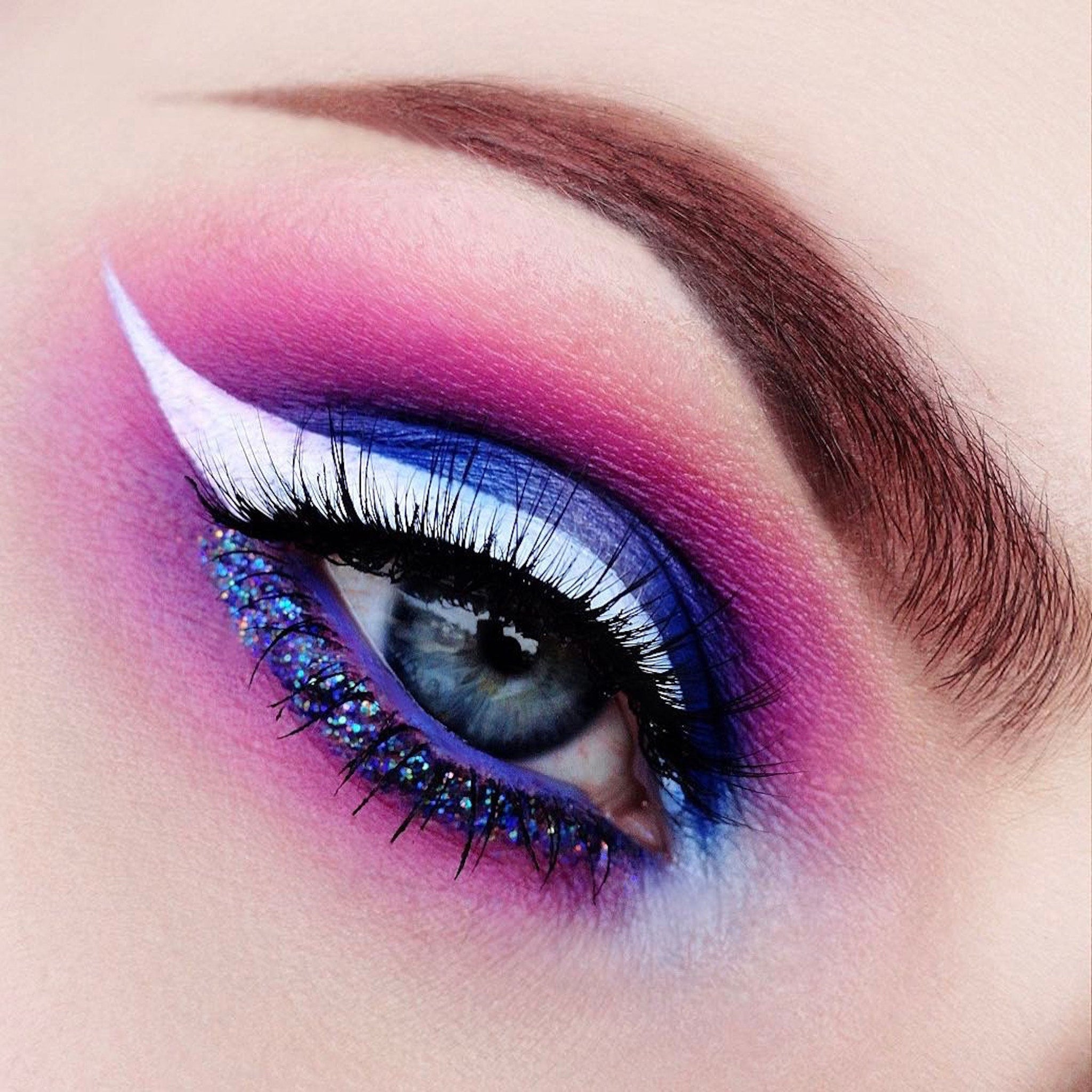 Close-up of Queen Pro matte eyeshadow pan showing rich pigment texture in a neutral brown shade