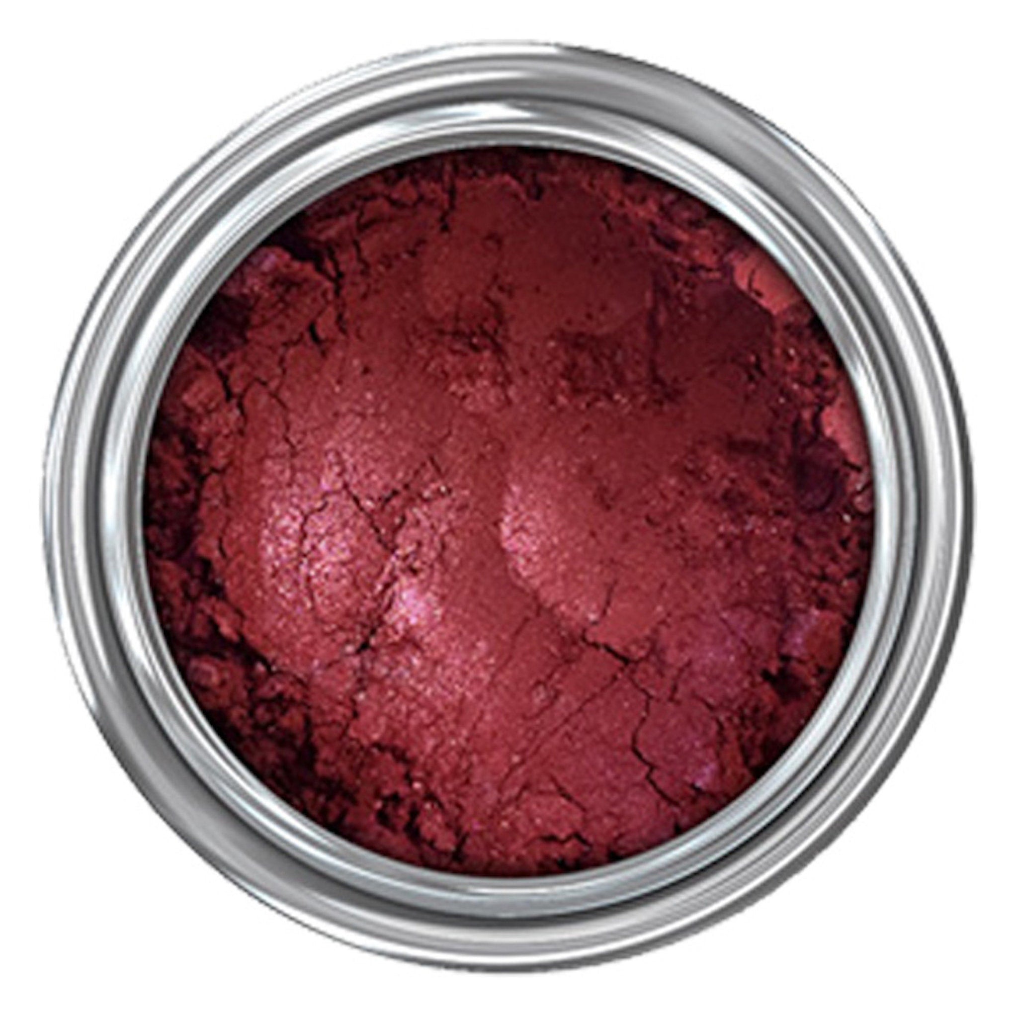 Close-up of Altar of Roses Mineral Eyeshadow showing rich, velvety texture in a warm rose-gold shade with subtle shimmer.