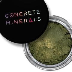 Mineral eyeshadow in olive green with metallic shimmer, Concrete Minerals brand, in silver container