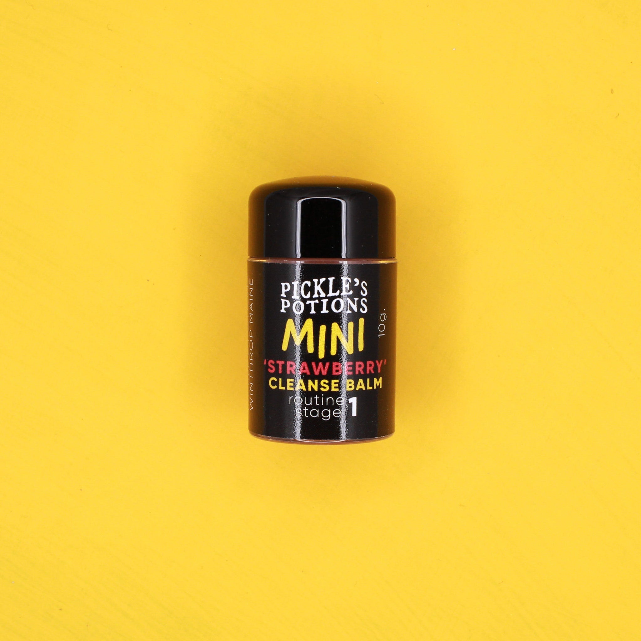 Mini Cleanser balm in black and red container with Pickle's Mini text on yellow background